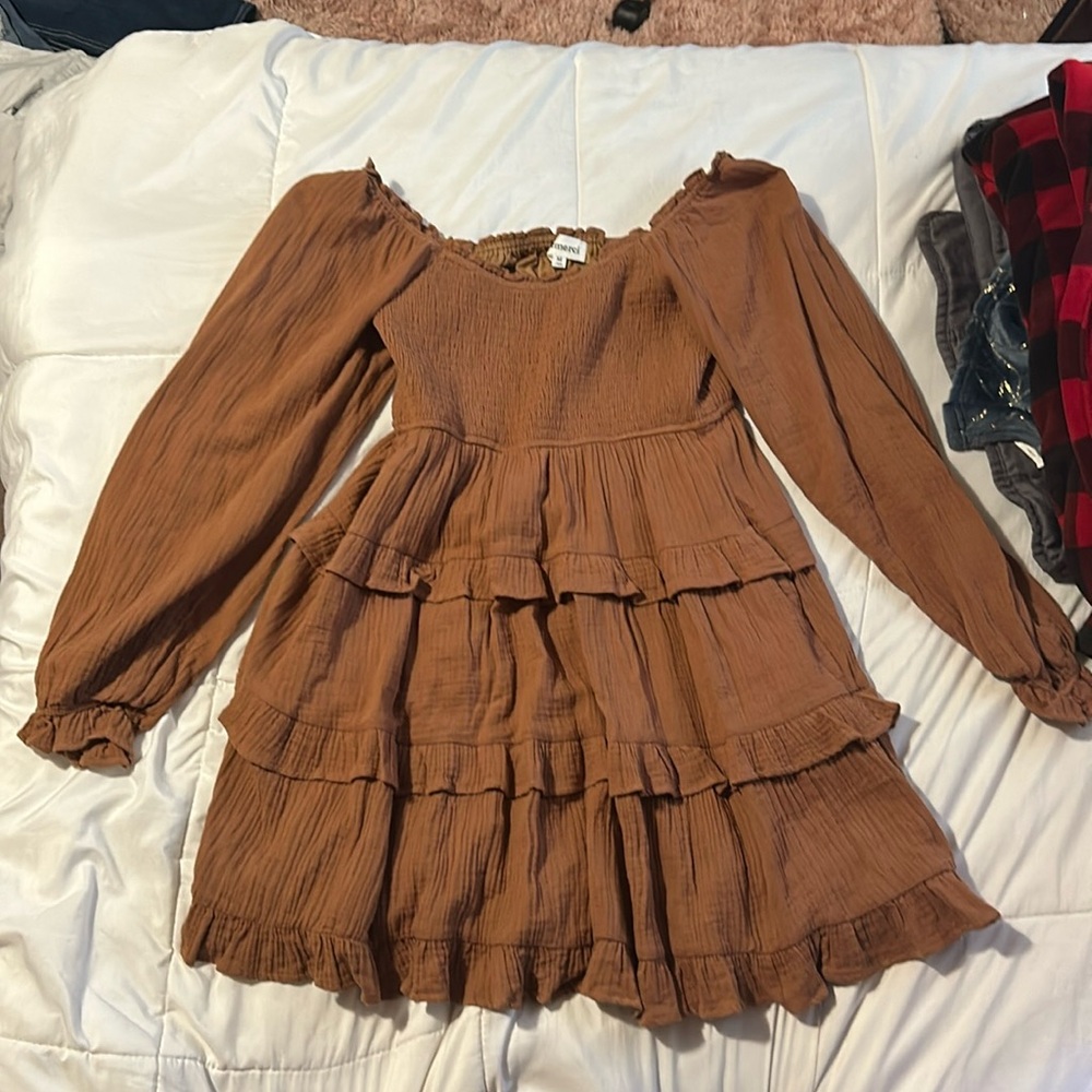 Brown flowey dress with puff sleeves from a boutique in downtown town bay city